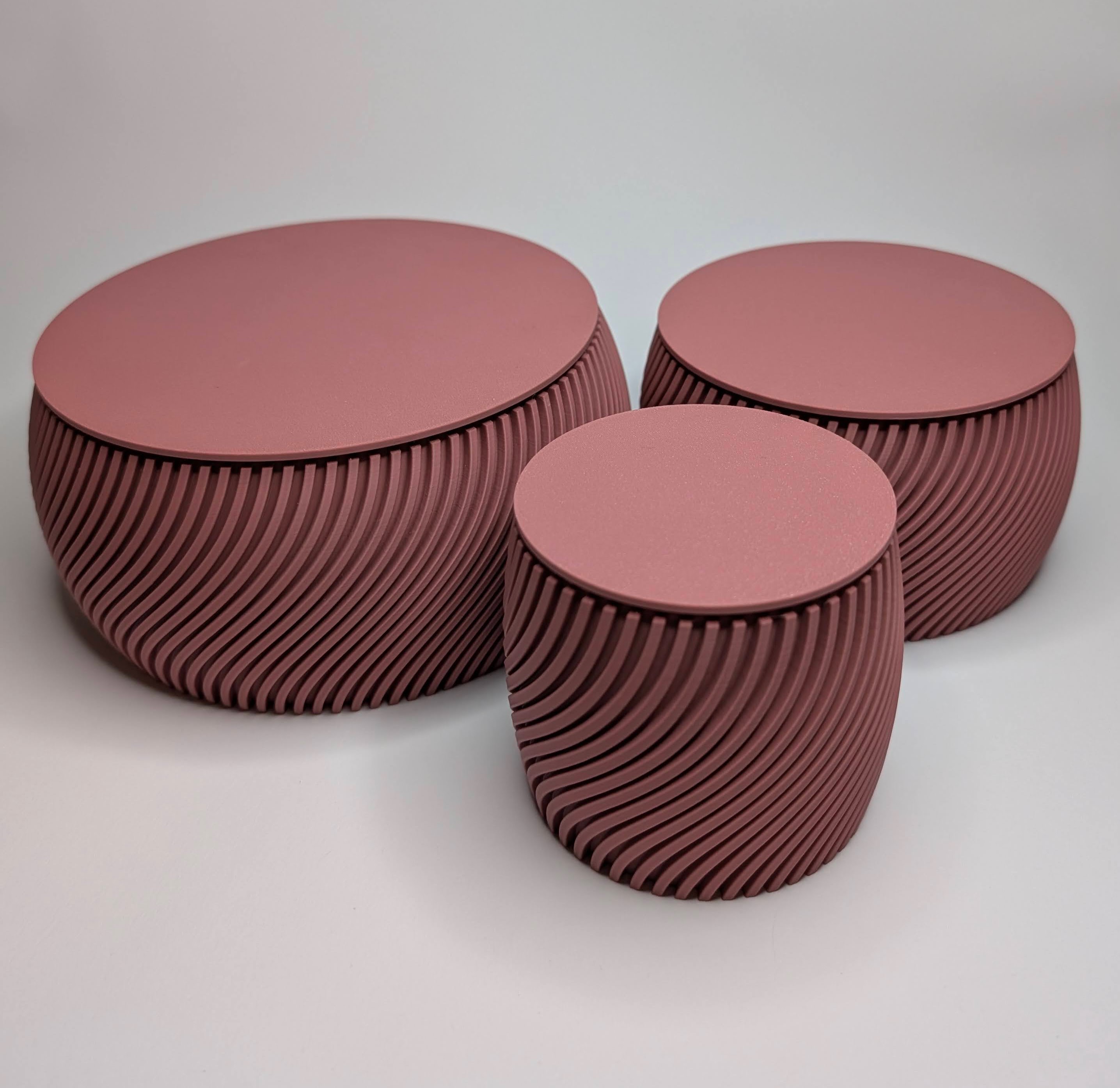 3D-printet boks sett i rosa, egnet for oppbevaring.